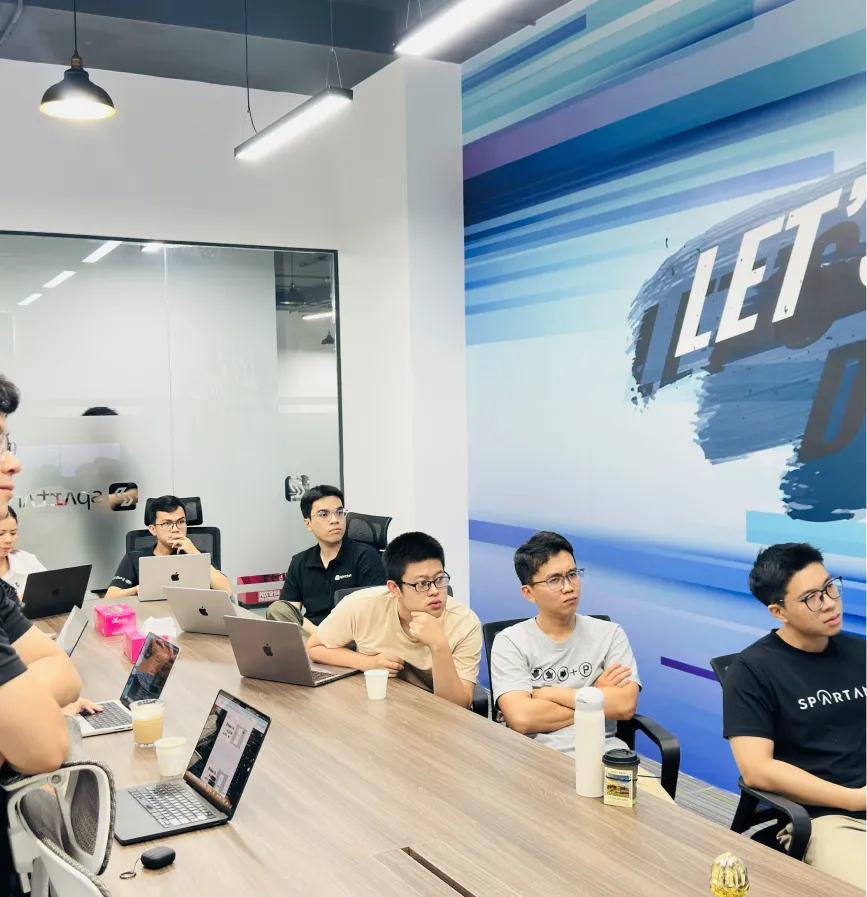 LayerProof team collaborating in the office